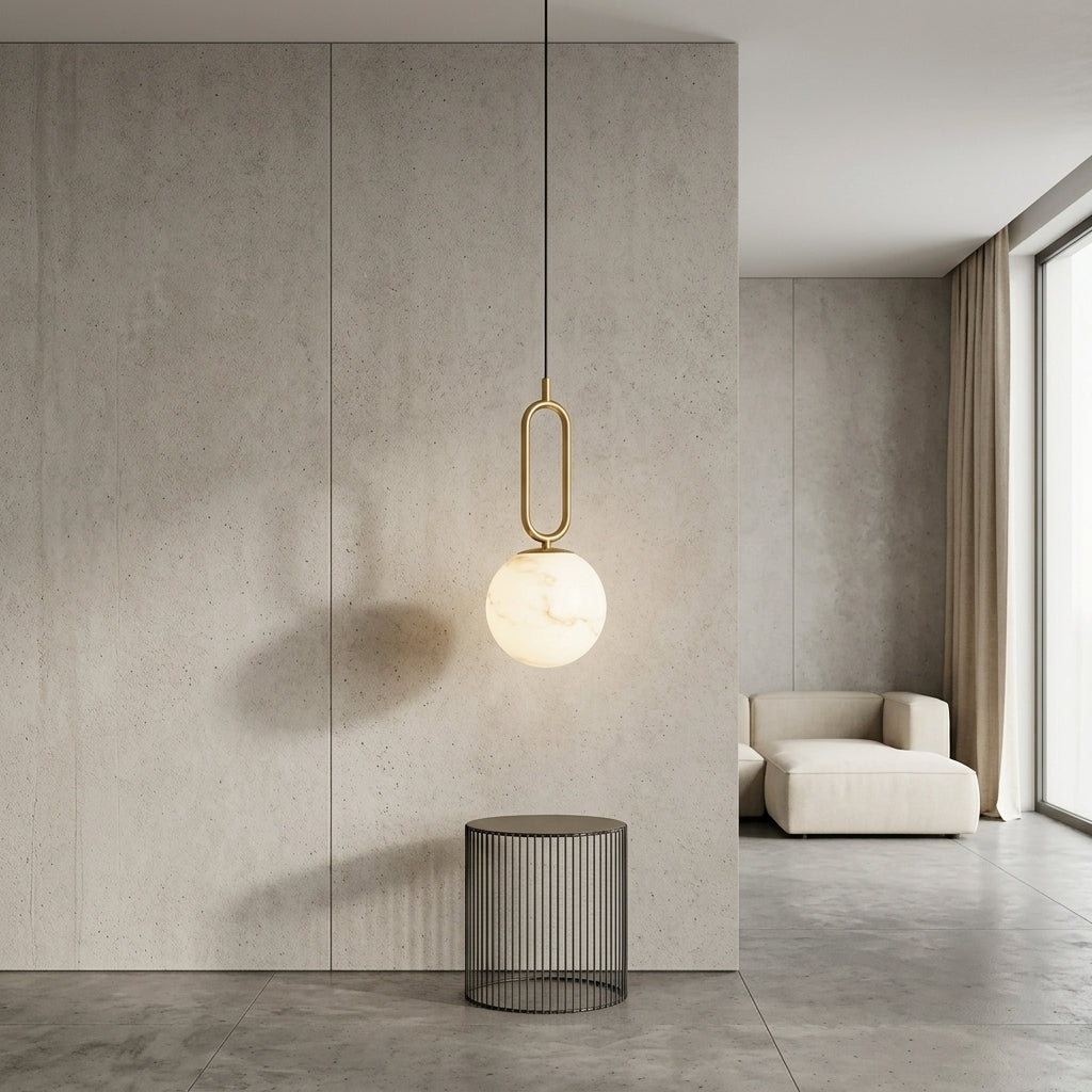 Marble ball pendant light in gold