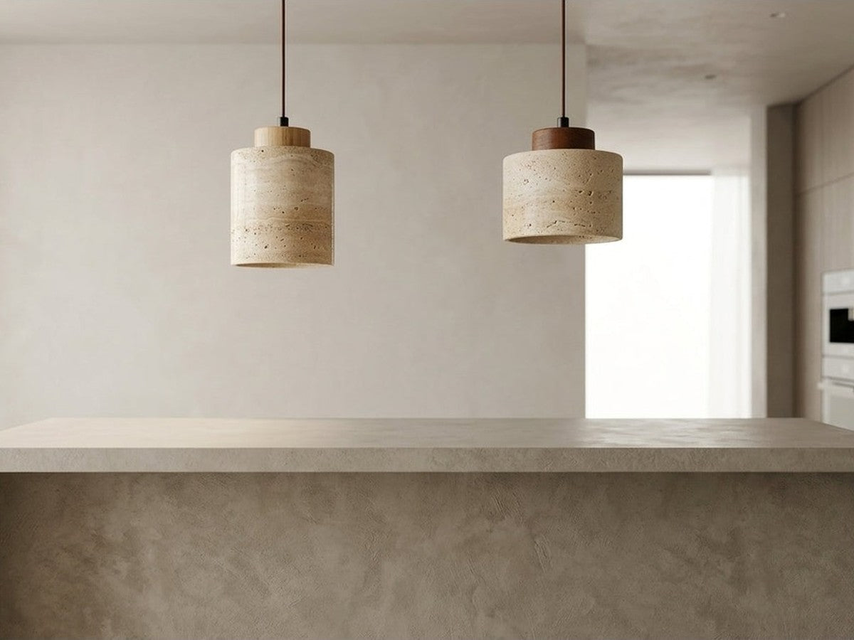 Two stone pendant lights above a kitchen island.