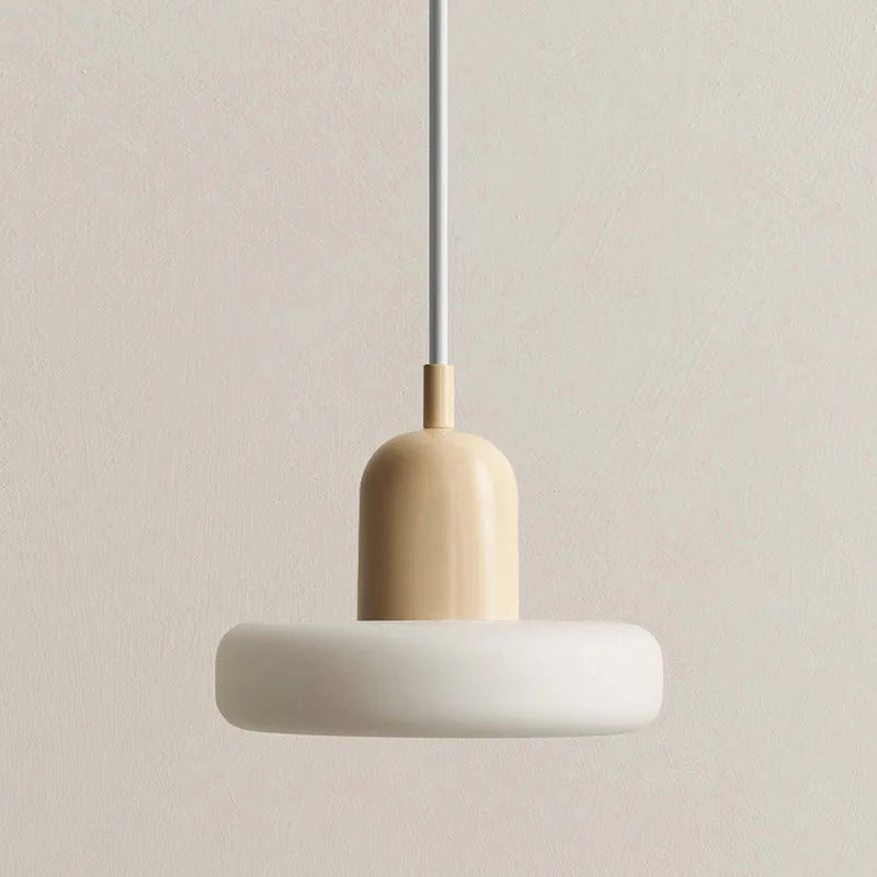 Cream glass saucer pendant light with a beige top