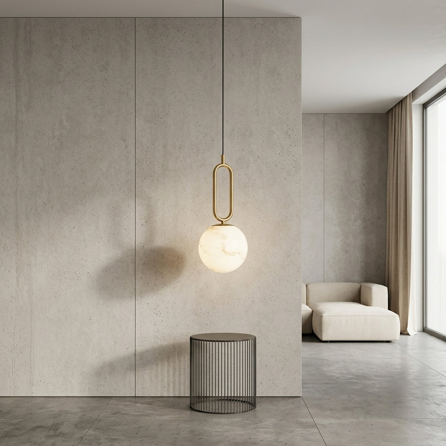 Marble ball pendant light in gold