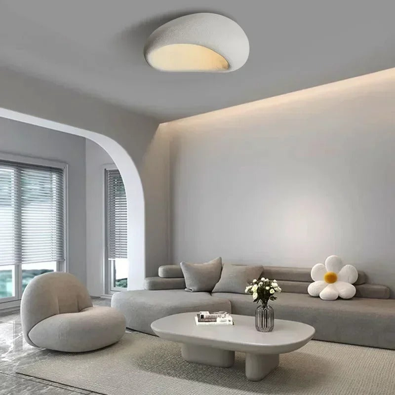 White oval ceiling light in a living room